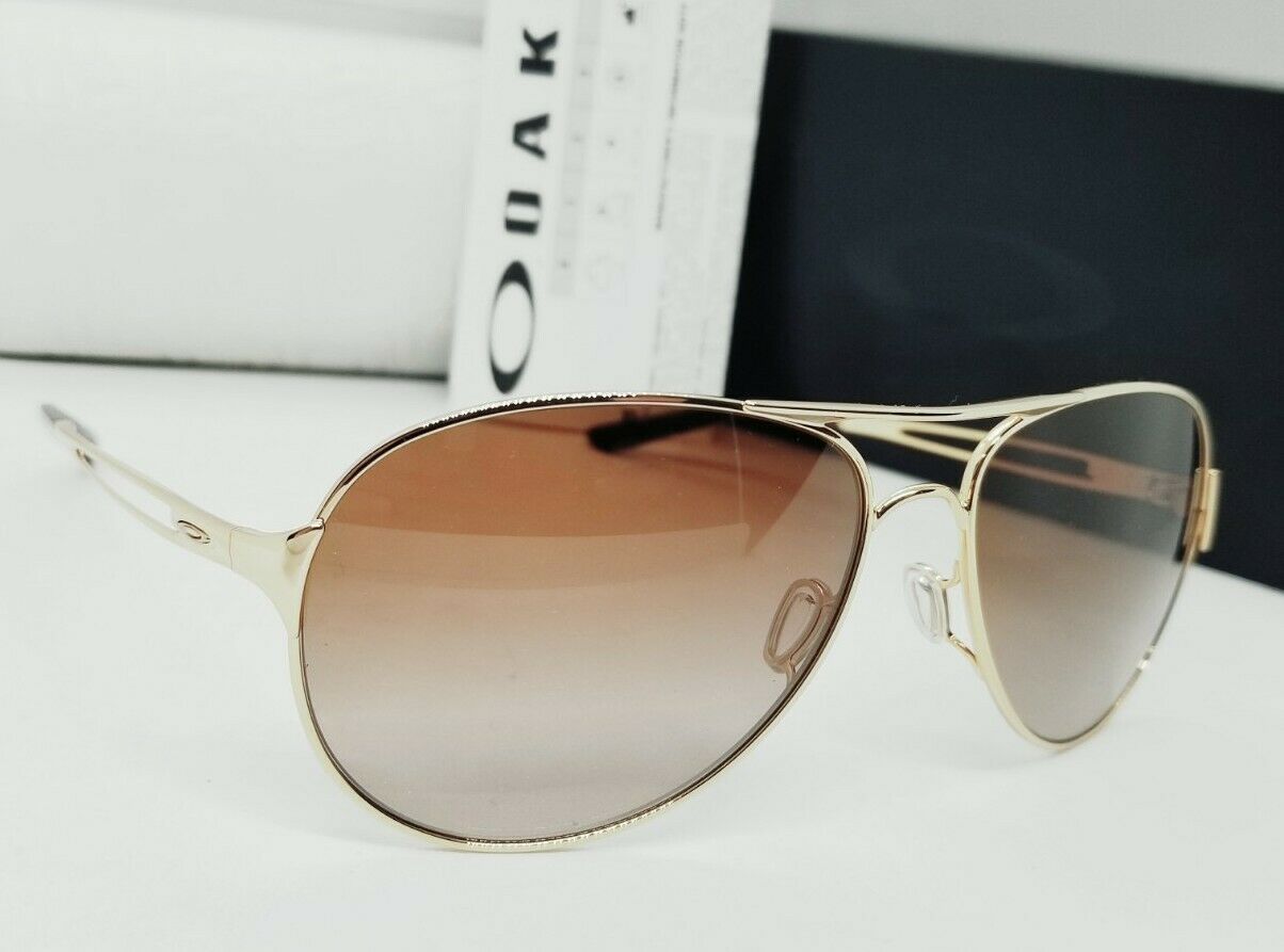 Oakley CAVEAT sunglasses - Polished Gold/Brown Gradient