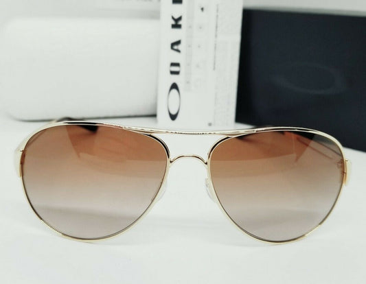 Oakley CAVEAT sunglasses - Polished Gold/Brown Gradient