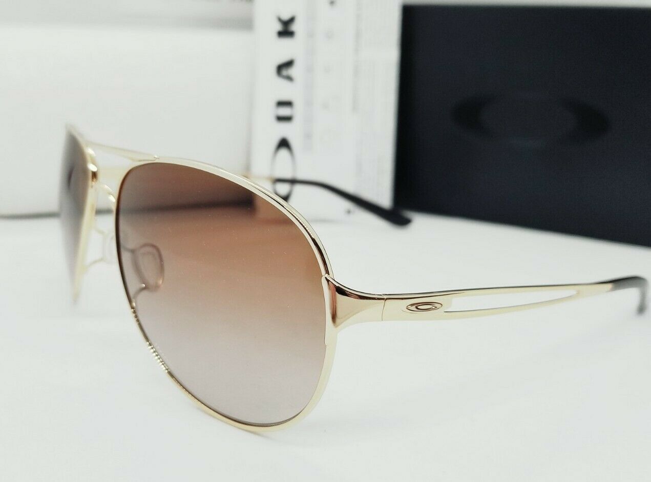 Oakley CAVEAT sunglasses - Polished Gold/Brown Gradient