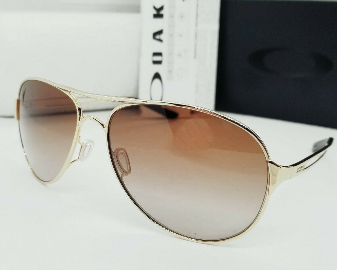 Oakley CAVEAT sunglasses - Polished Gold/Brown Gradient