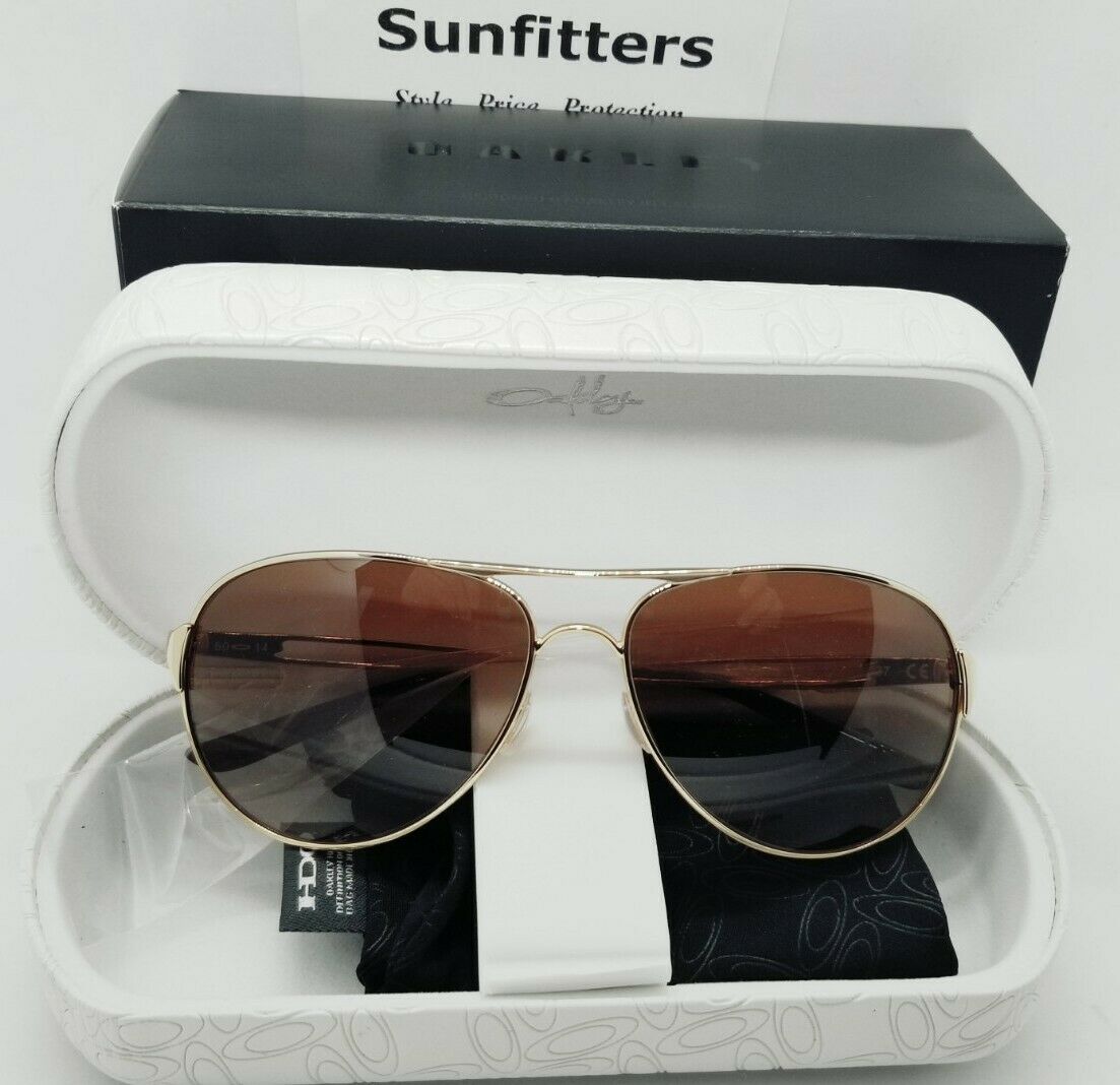 Oakley CAVEAT sunglasses - Polished Gold/Brown Gradient